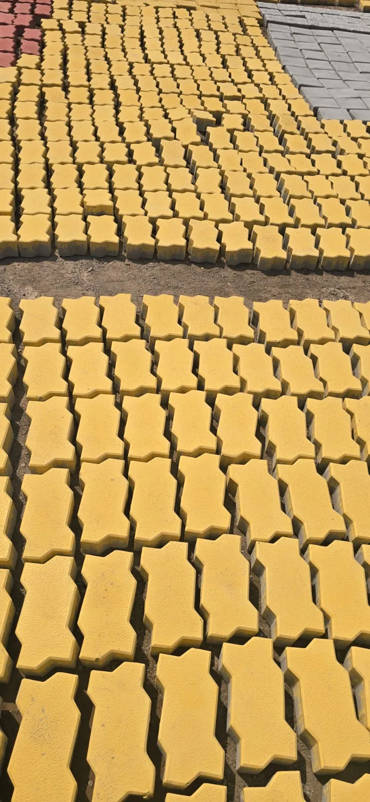 Yellow interlocking paver blocks supplied by Gurukrupa Enterprises