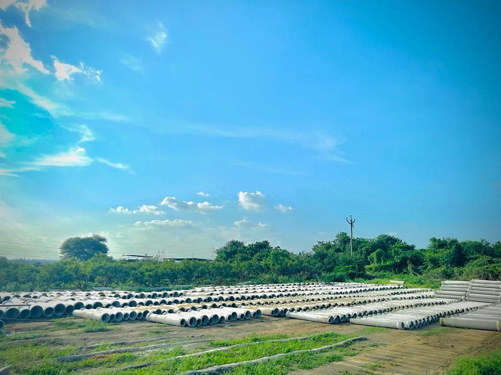 Wide establishing shot of the Gurukrupa Enterprises precast manufacturing yard